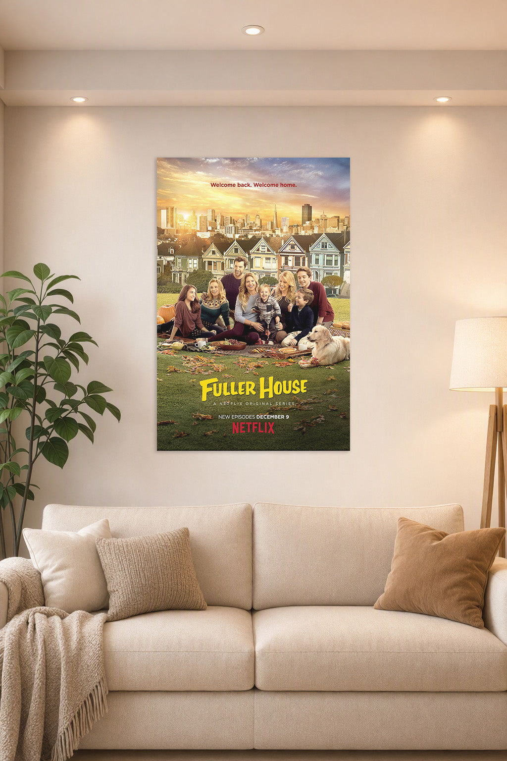 Fuller House Family Cast in a bright living room above a beige sofa.