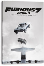 Furious 7 canvas wall art print displays two airborne cars over an airplane tail in misty gray clouds and bold black title text.