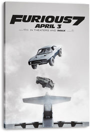 Furious 7 canvas wall art print displays two airborne cars over an airplane tail in misty gray clouds and bold black title text.