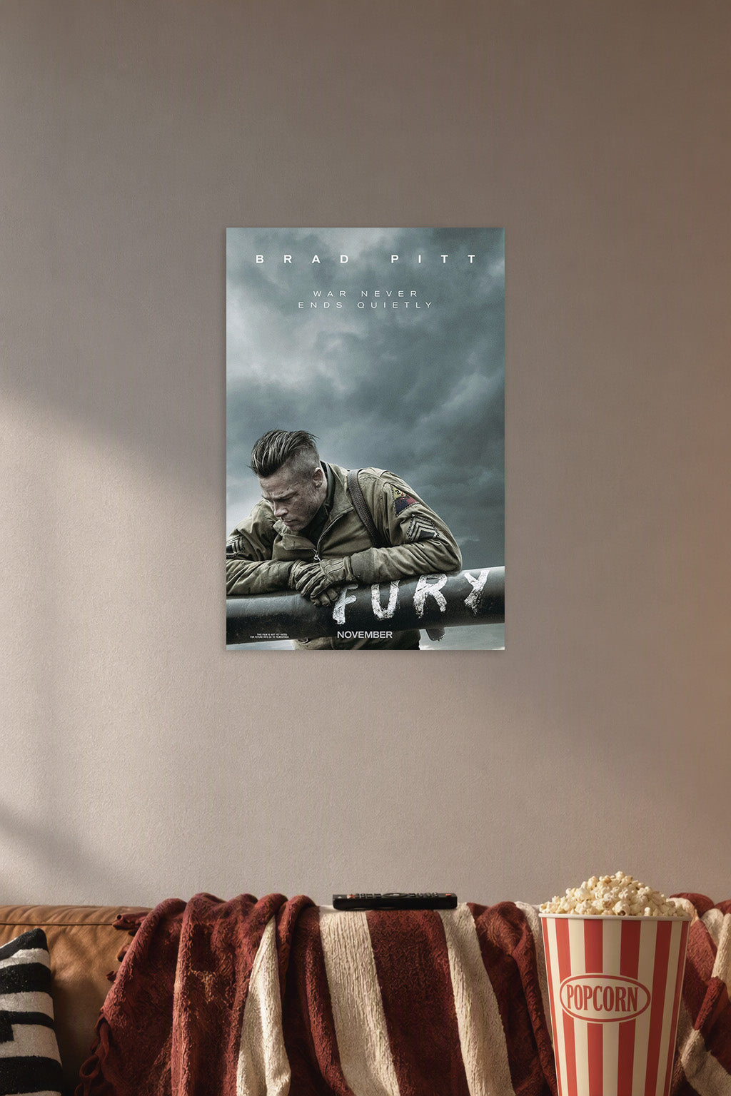 Fury Movie Poster in a cozy movie room above a brown sofa with popcorn.