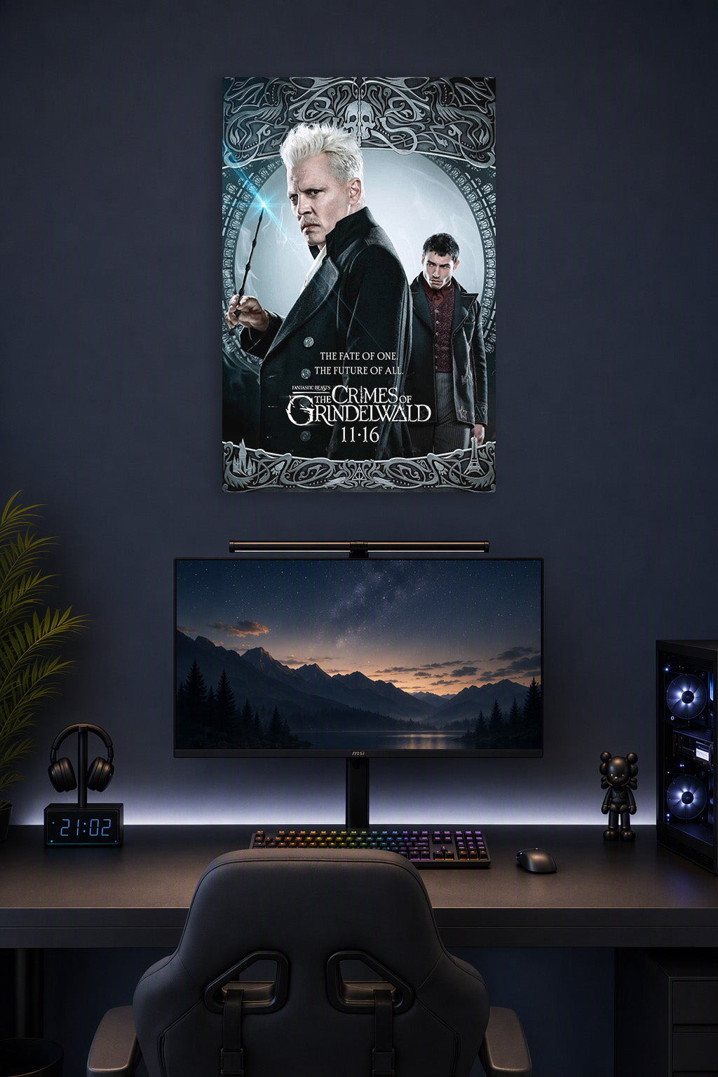 Gellert Grindelwald in a gaming desk setup above a monitor.