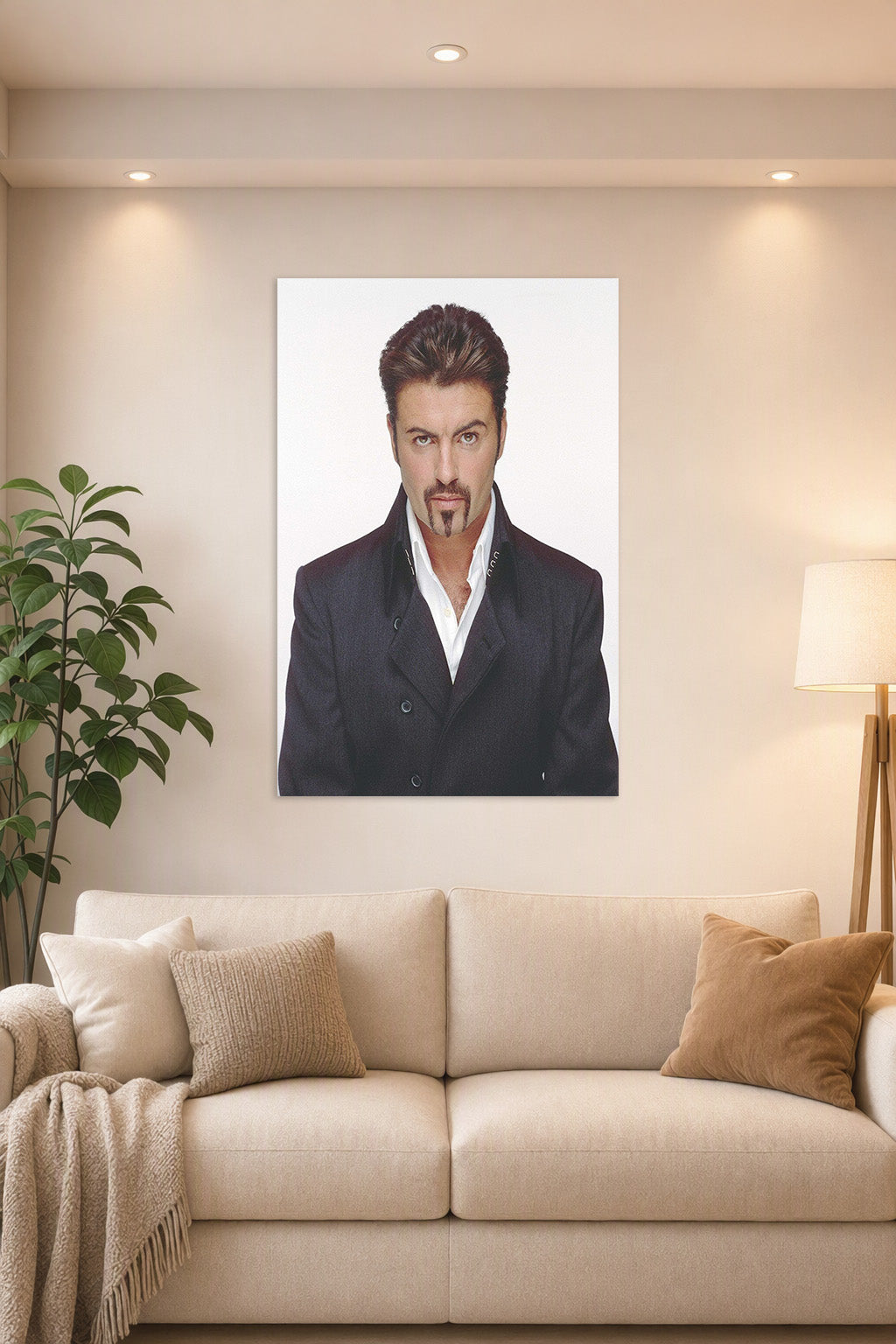 George Michael in a bright living room above a beige sofa.