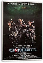 Ghostbusters canvas wall art print with white wrapped edges, three ghost hunters in gray jumpsuits, and bold title text.