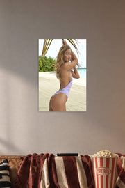 Gigi Hadid Beach Fashion in a cozy movie room above a brown sofa with popcorn.