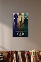 Glass Movie Poster in a cozy movie room above a brown sofa with popcorn.