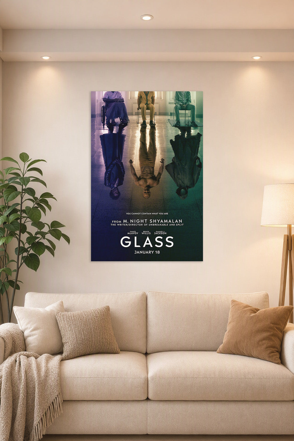 Glass Movie Poster in a bright living room above a beige sofa.