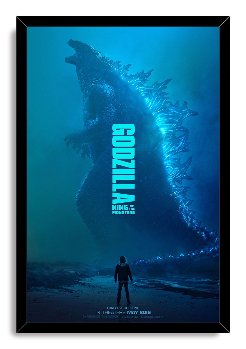 Godzilla framed wall art print depicts the colossal creature's luminous blue spines and a lone figure beneath the vertical title.