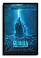 Godzilla King of the Monsters framed wall art print displays Godzilla in a blue ocean storm, projecting a white beam while aircraft surround him.