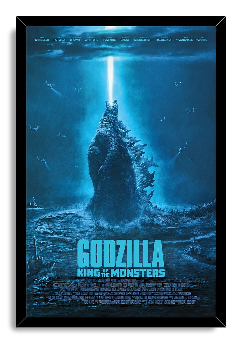 Godzilla King of the Monsters framed wall art print displays Godzilla in a blue ocean storm, projecting a white beam while aircraft surround him.