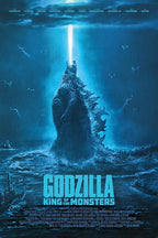 Godzilla King of the Monsters poster depicts Godzilla rising from a stormy blue ocean and firing a white beam skyward as aircraft circle.