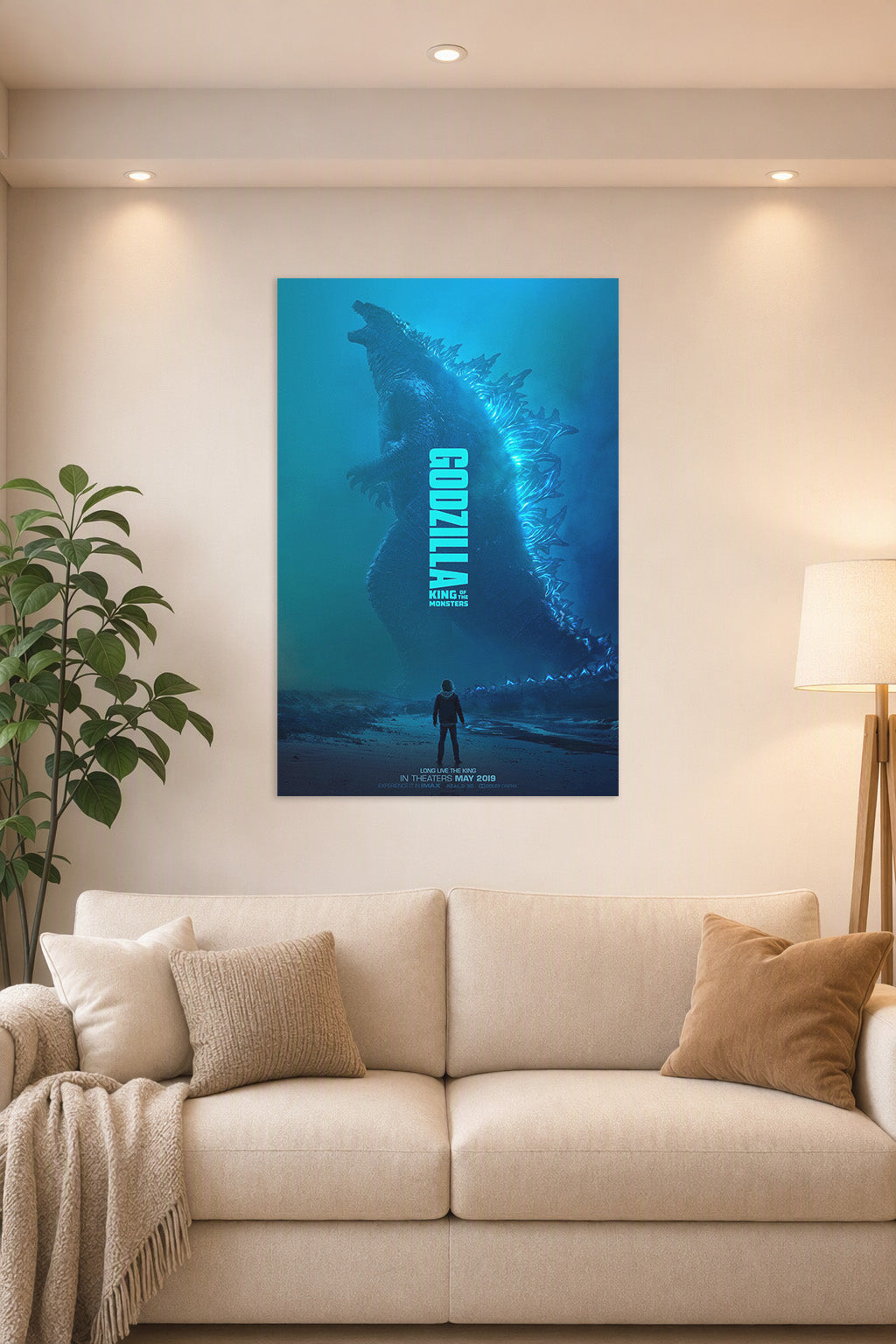 Godzilla: King of the Monsters in a bright living room above a beige sofa.