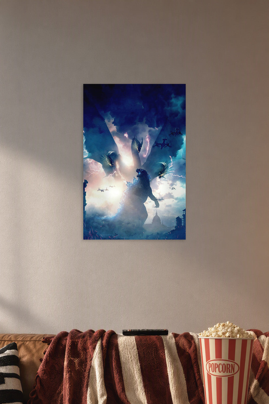 Godzilla King of the Monsters Epic Battle in a cozy movie room above a brown sofa with popcorn.