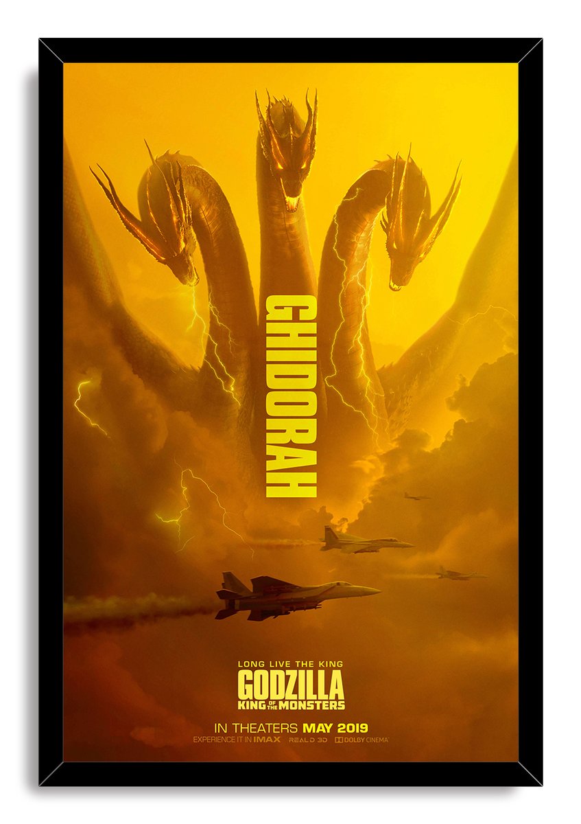 King Ghidorah framed wall art print features the three-headed dragon over lightning and military jets in a black-edged frame.
