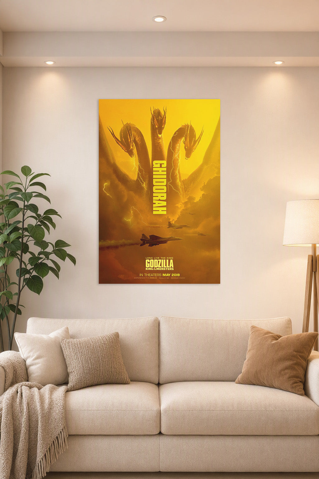 Godzilla King of the Monsters King Ghidorah Movie Poster in a bright living room above a beige sofa.