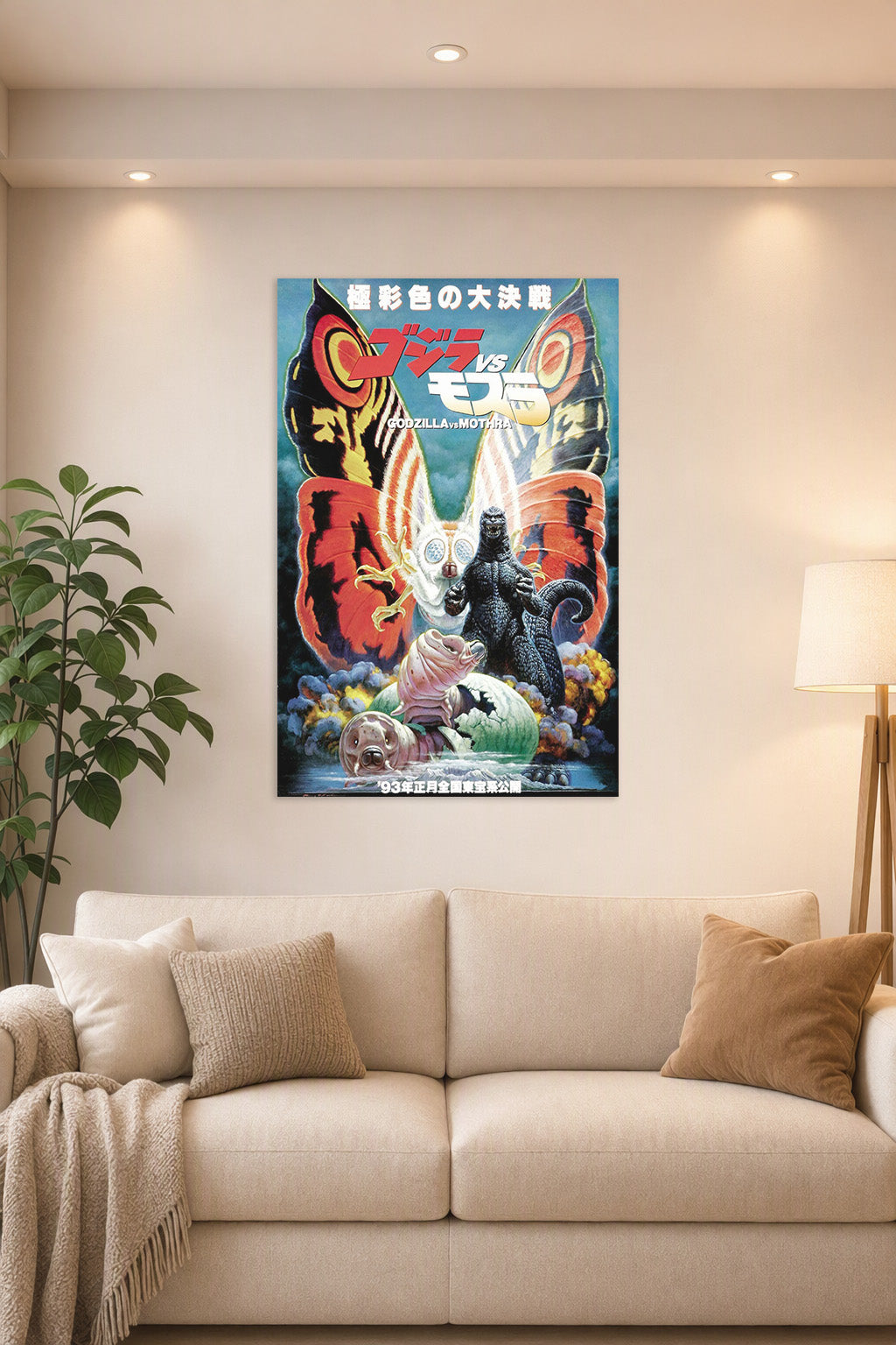 Godzilla vs. Mothra Kaiju Movie in a bright living room above a beige sofa.