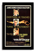 Goldfinger movie poster wall art print in a black frame, featuring Sean Connery portraits, a reclining woman, and vintage yellow typography.