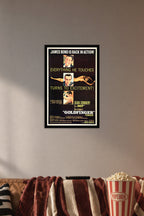 Goldfinger James Bond Movie in a cozy movie room above a brown sofa with popcorn.