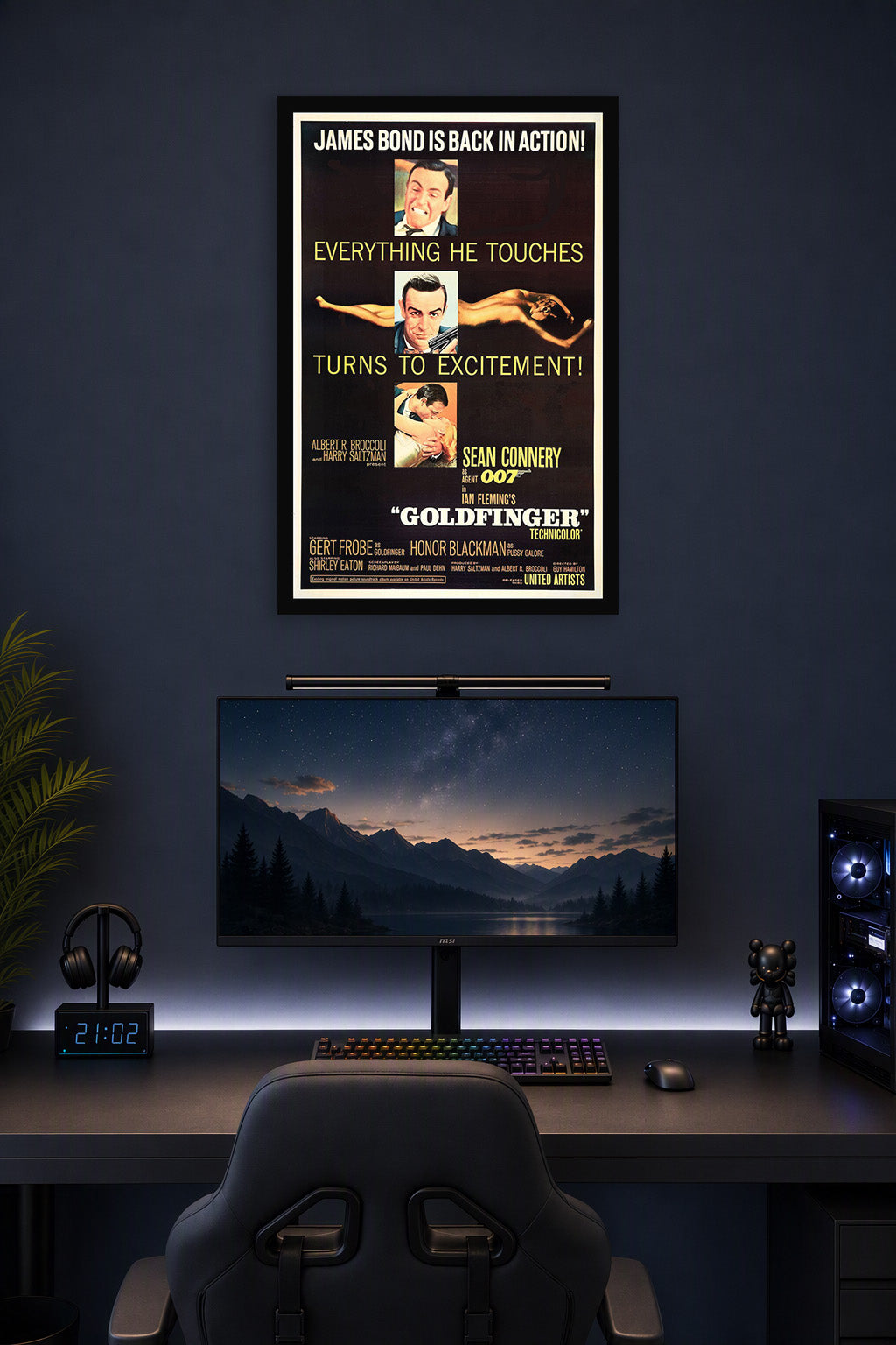 Goldfinger James Bond Movie in a gaming desk setup above a monitor.