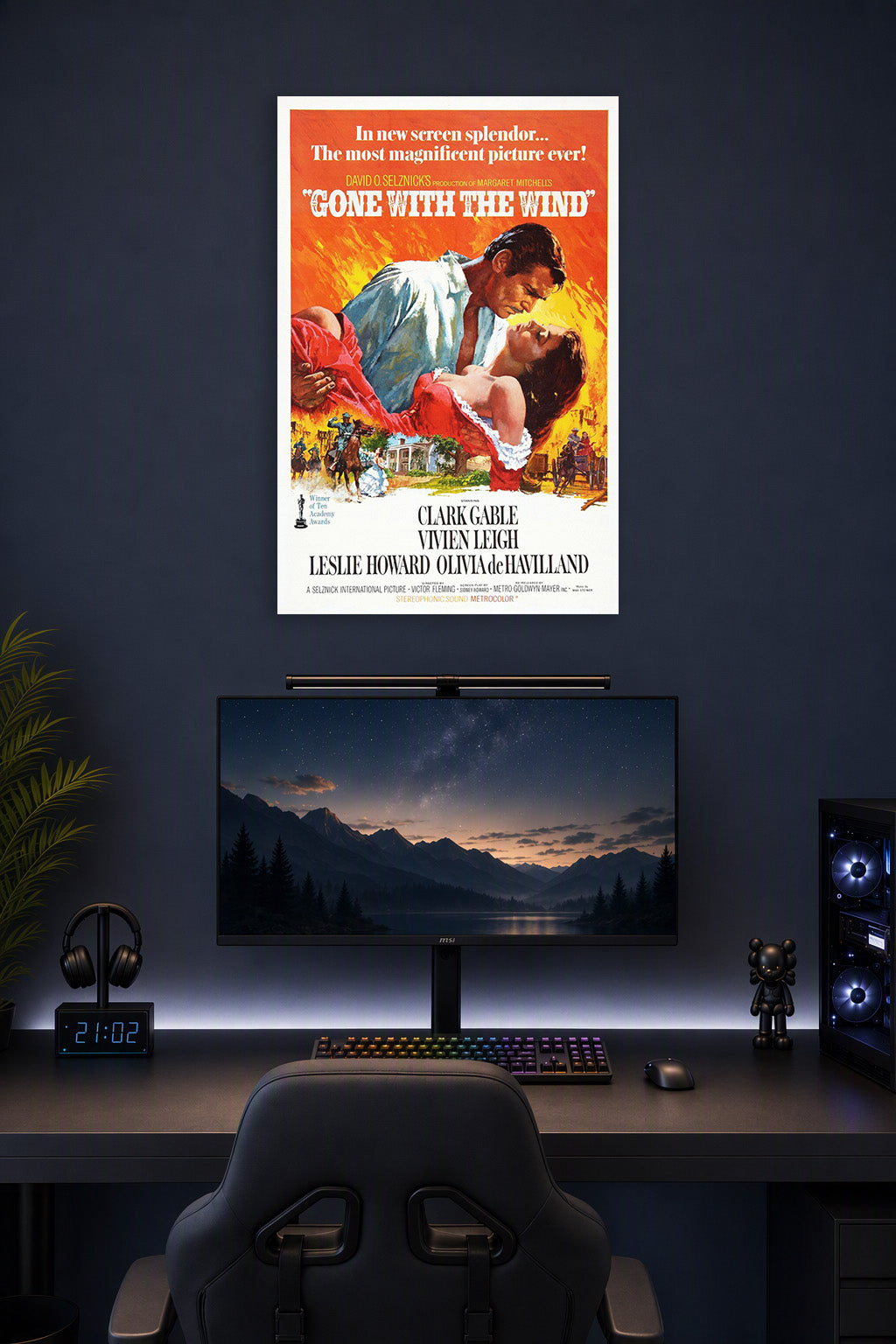 Gone With The Wind Movie Poster in a gaming desk setup above a monitor.