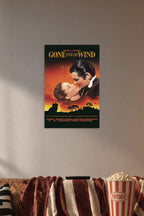 Gone With the Wind in a cozy movie room above a brown sofa with popcorn.