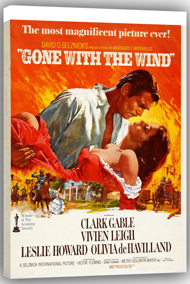 Gone with the Wind wall art canvas displaying the classic romantic embrace in red and orange, with riders, a carriage, and a mansion below.