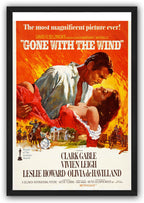 Gone with the Wind framed wall art print featuring the dramatic couple in an embrace, fiery orange background, riders, carriage, and mansion.