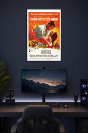 Gone with The Wind Movies in a gaming desk setup above a monitor.