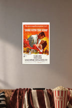 Gone with The Wind Movies in a cozy movie room above a brown sofa with popcorn.