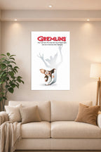 Gremlins in a bright living room above a beige sofa.