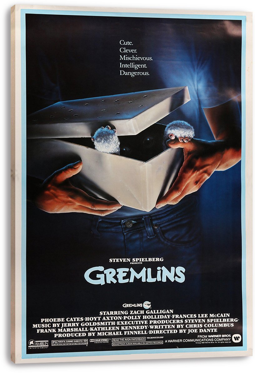Gremlins movie poster canvas print featuring an open box held in hands, furry creature paws, blue shadows, and title lettering.