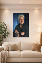 Guy Fieri in a bright living room above a beige sofa.