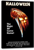 Halloween canvas wall art print displayed with a black wrapped edge, featuring a knife, clenched hand, and glowing carved pumpkin.