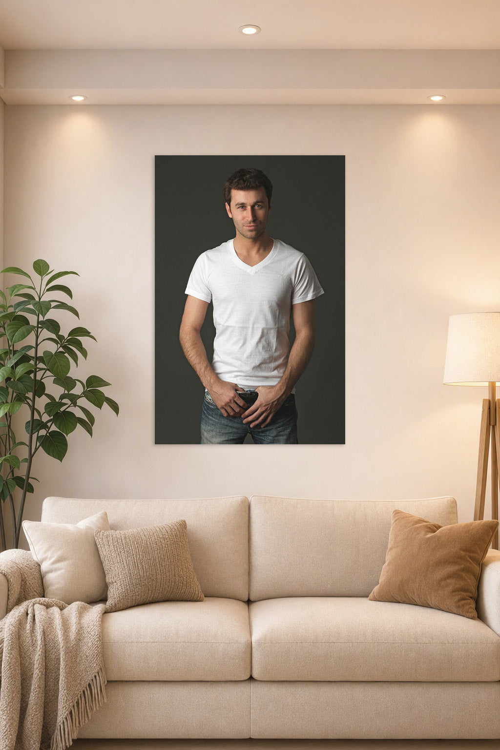 Handsome Man in a bright living room above a beige sofa.