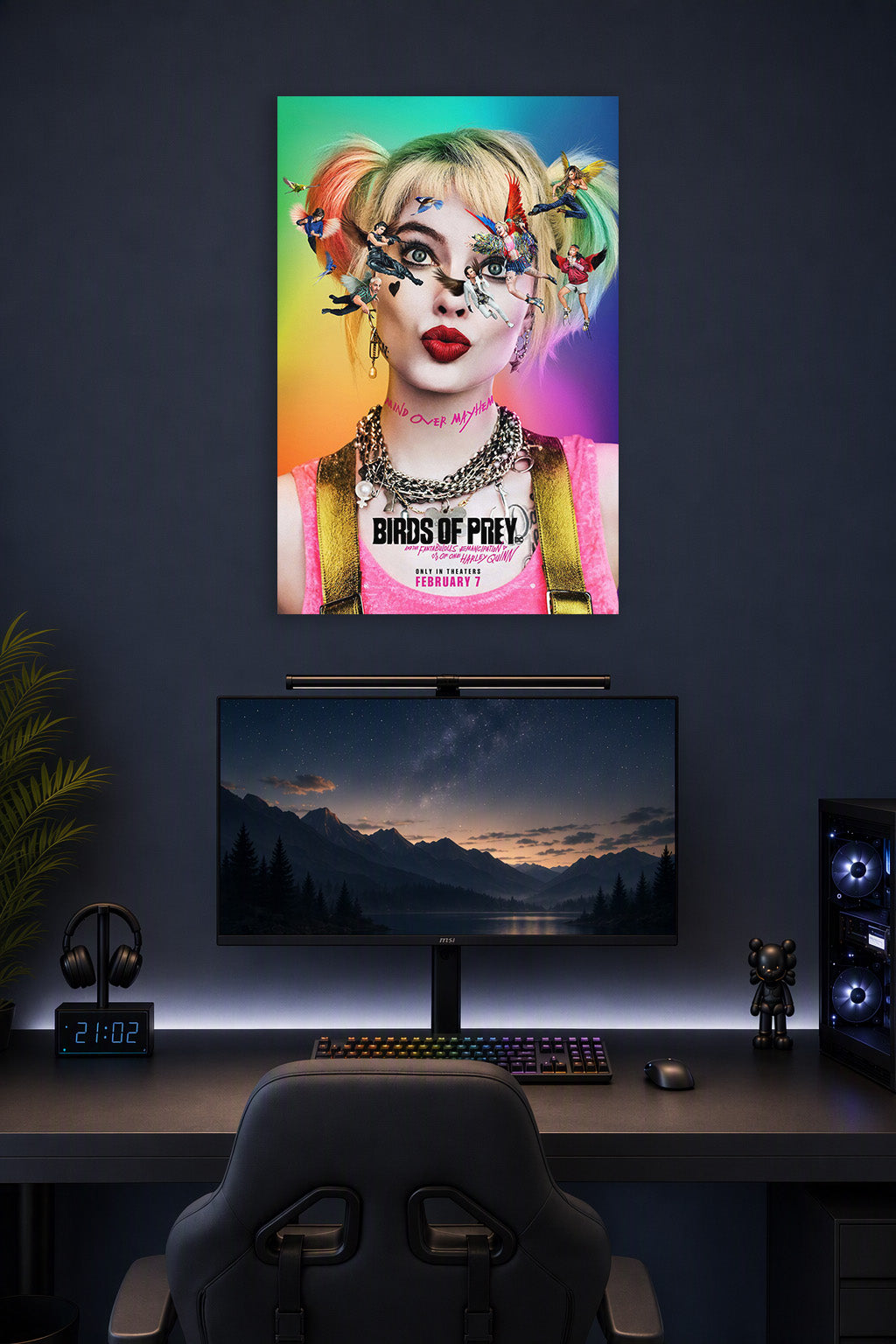 Harley Quinn & Birds of Prey in a gaming desk setup above a monitor.