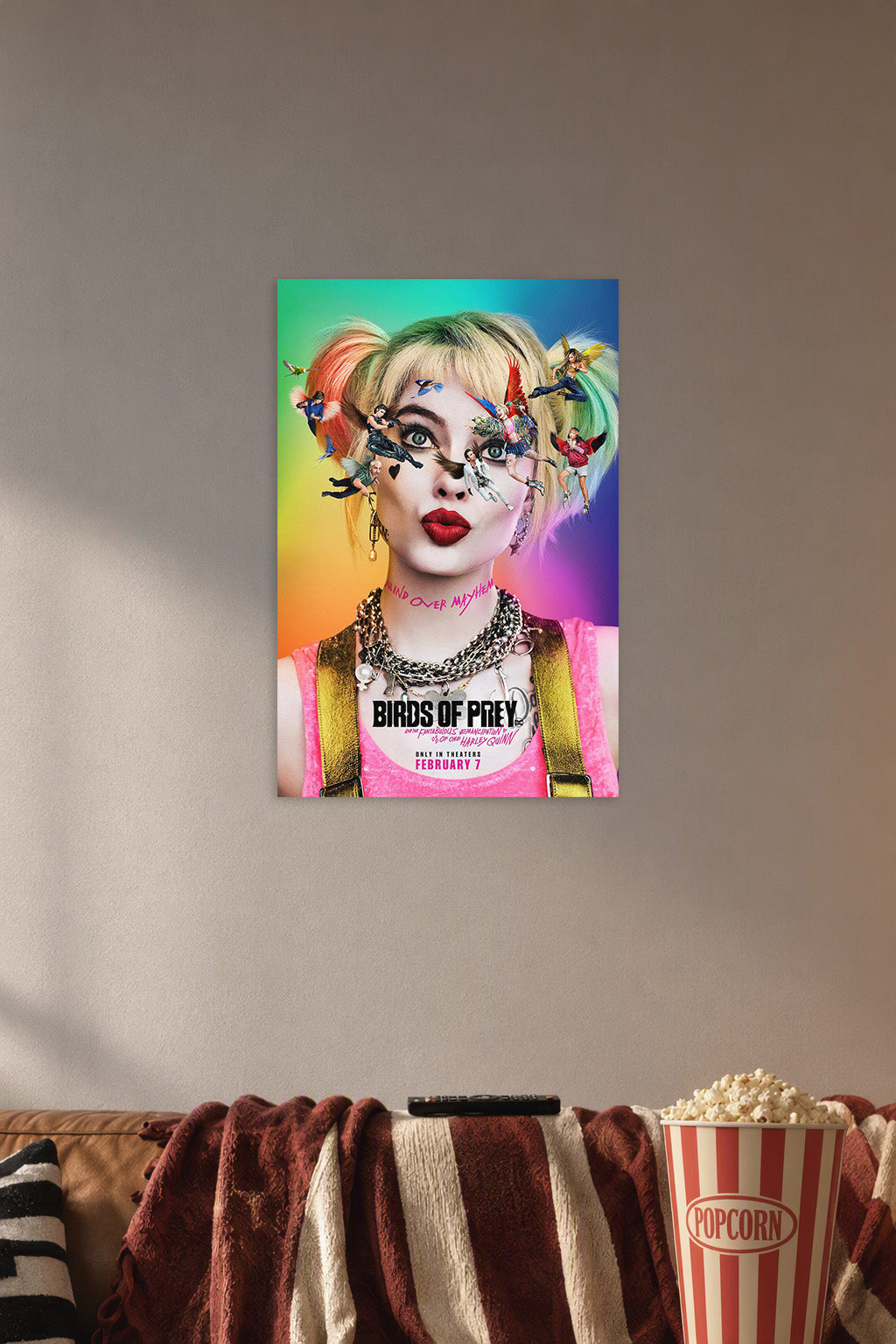 Harley Quinn & Birds of Prey in a cozy movie room above a brown sofa with popcorn.