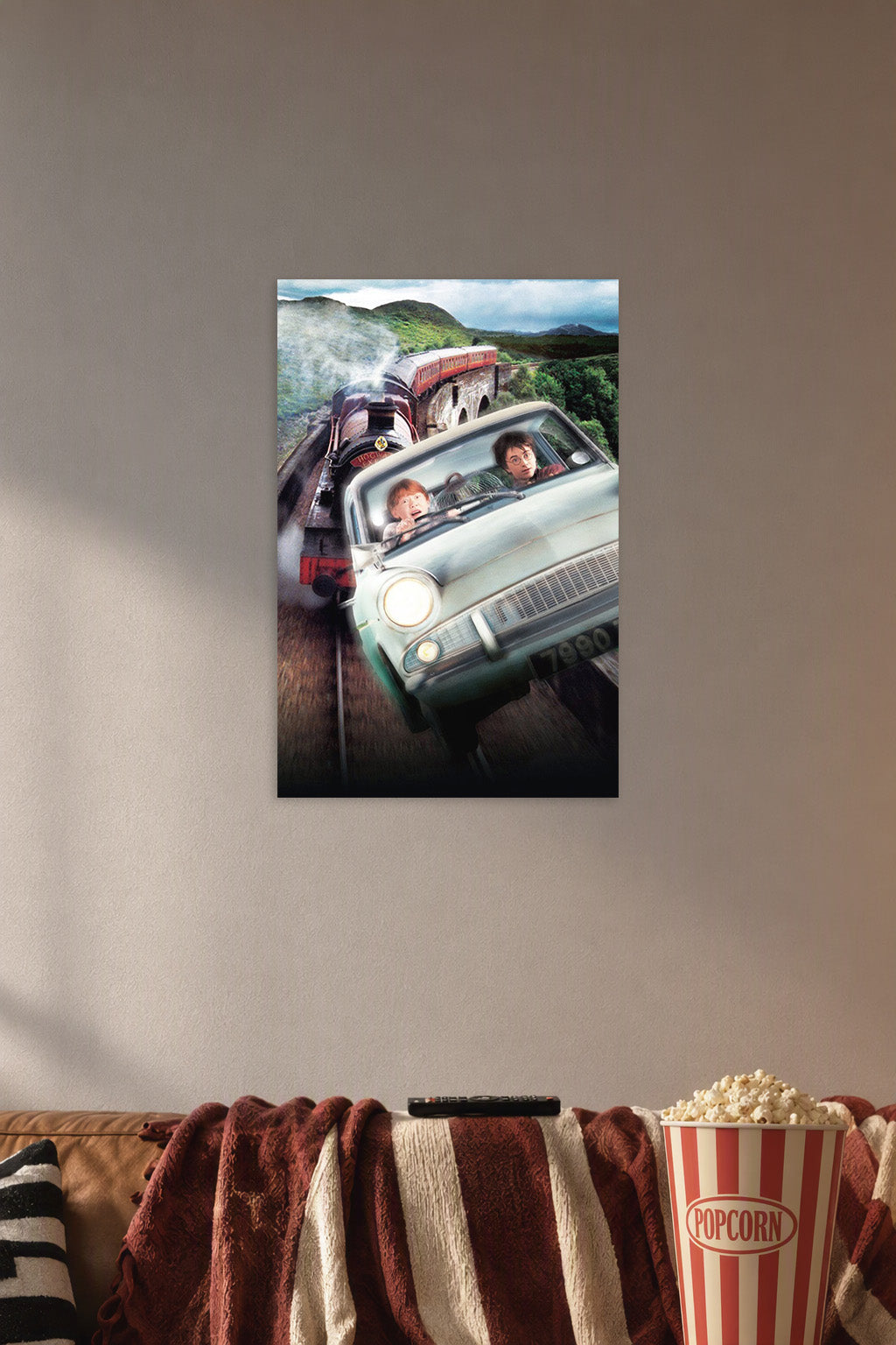 Harry Potter and Ron Weasley Flying Car in a cozy movie room above a brown sofa with popcorn.