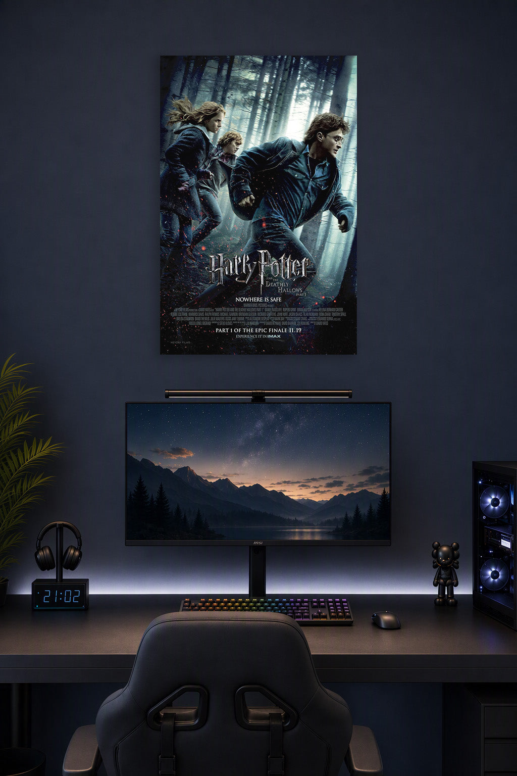 Harry Potter and the Deathly Hallows Part 1 in a gaming desk setup above a monitor.