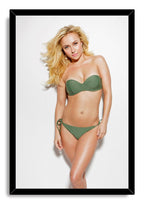 Hayden Panettiere framed wall art print with a black border, featuring her posed in a green bikini against white.