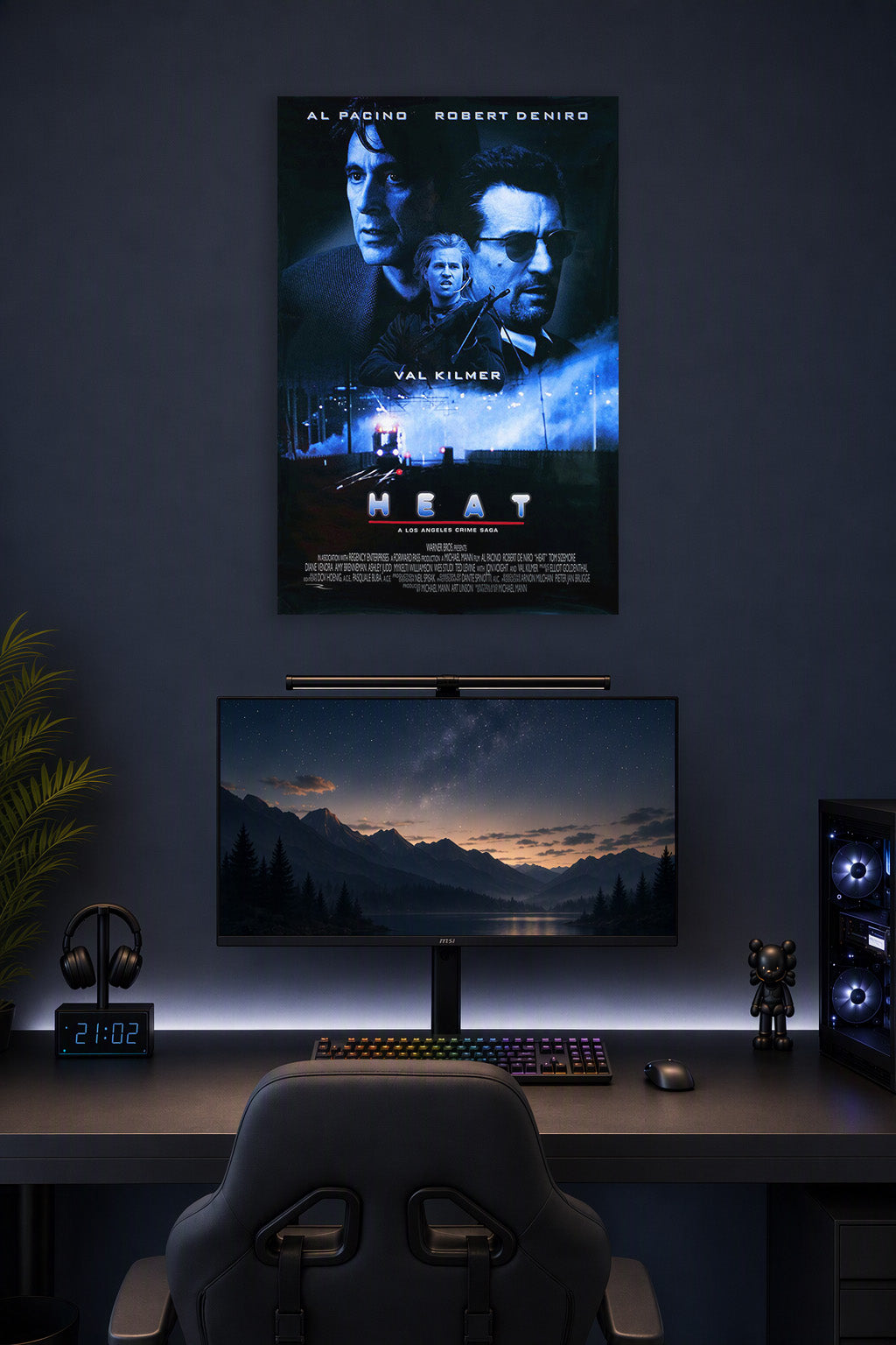 Heat Movie Al Pacino Robert De Niro Val Kilmer in a gaming desk setup above a monitor.