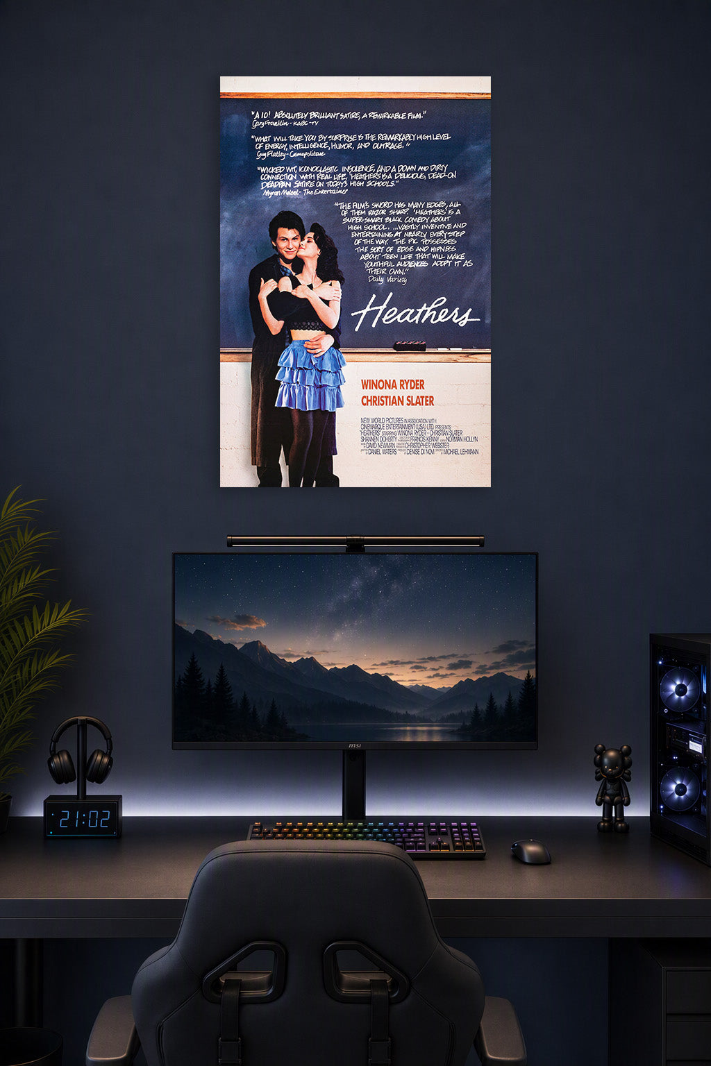Heathers Movie in a gaming desk setup above a monitor.