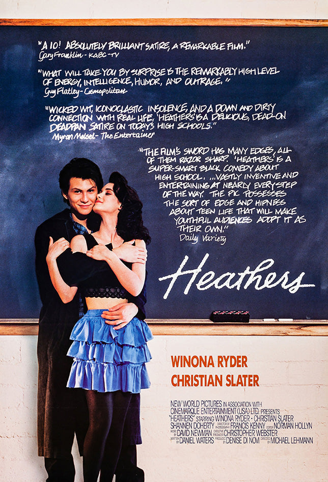 Heathers movie poster features Winona Ryder kissing Christian Slater before a chalkboard of white review quotes.
