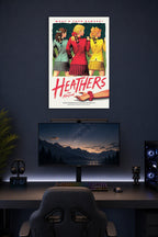 Heathers The Musical in a gaming desk setup above a monitor.