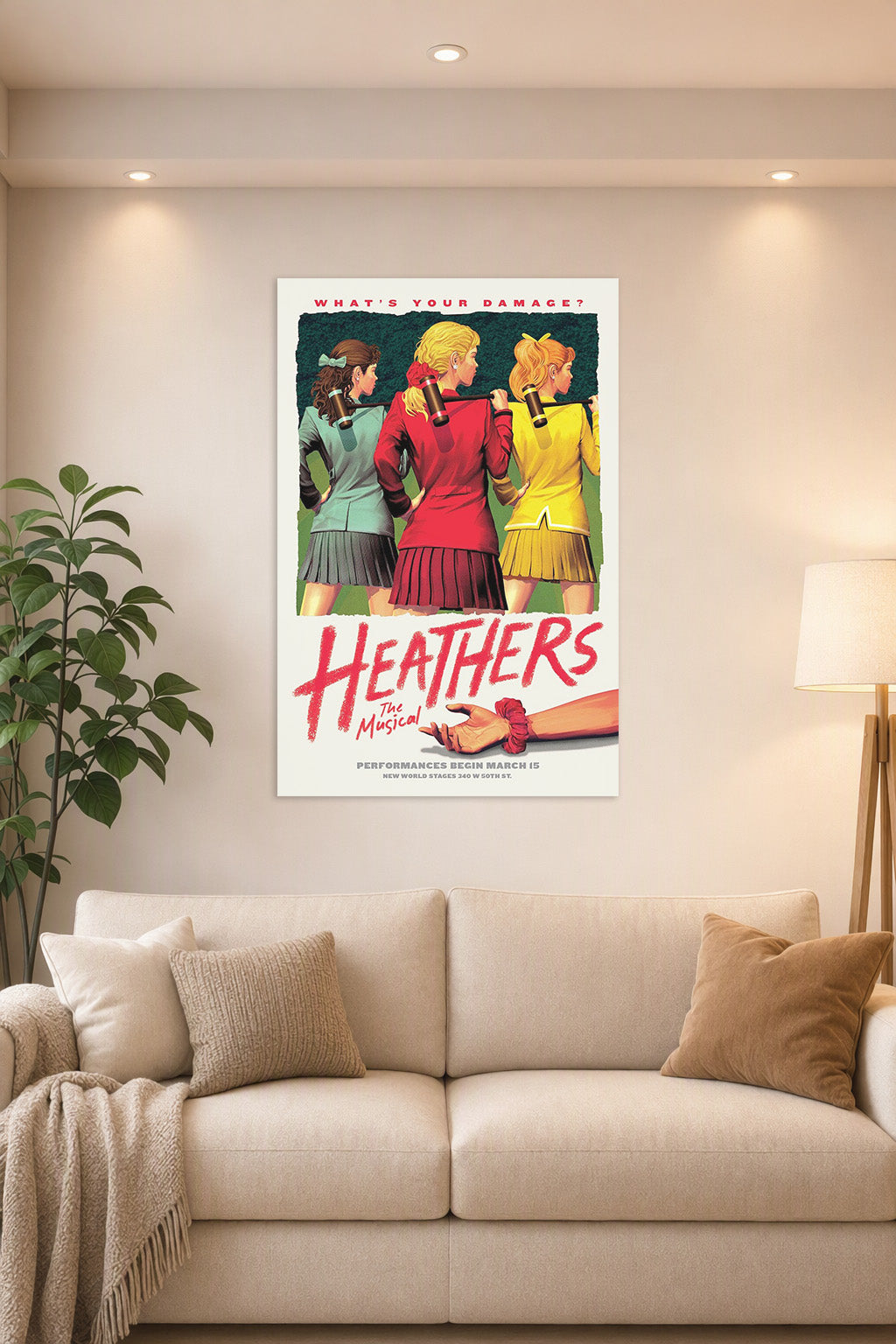 Heathers The Musical in a bright living room above a beige sofa.