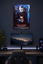 Hellraiser Pinhead in a gaming desk setup above a monitor.