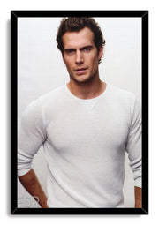 Henry Cavill framed wall art print displays a studio portrait in a white textured shirt, set within a sleek black frame.
