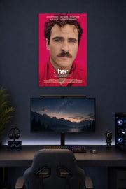 Her Movie Joaquin Phoenix in a gaming desk setup above a monitor.