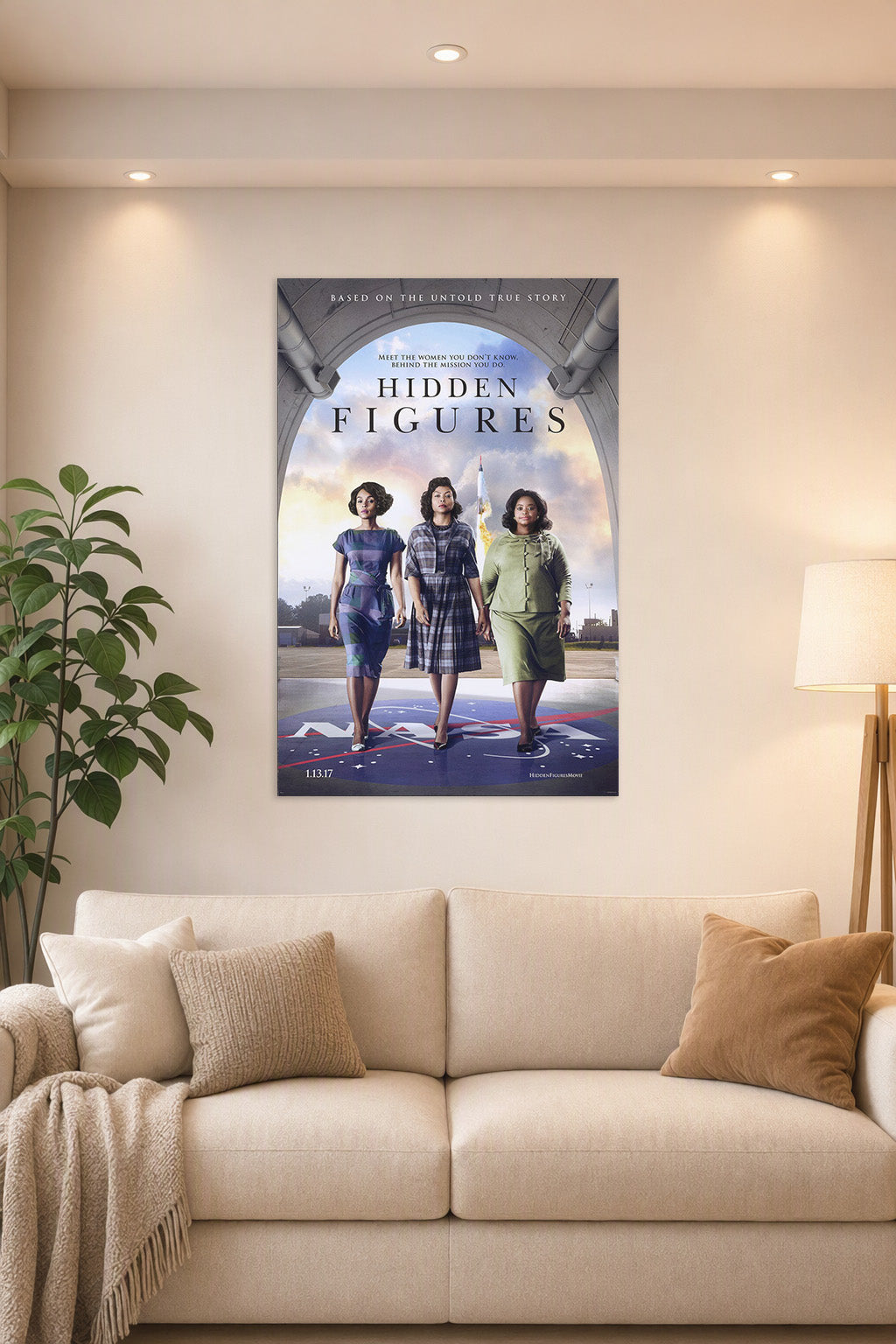 Hidden Figures Movie Poster in a bright living room above a beige sofa.