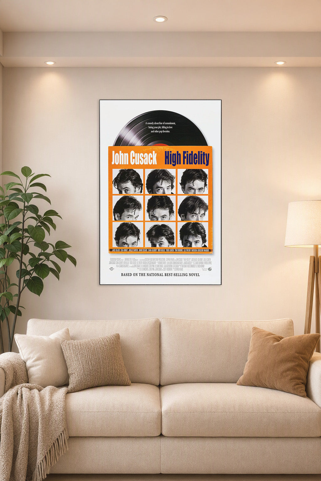 High Fidelity John Cusack in a bright living room above a beige sofa.
