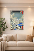 Hiroshige Style Winter Village Snowy Landscape in a bright living room above a beige sofa.