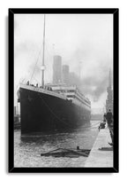 Titanic framed wall art print features a monochrome ocean liner at the quay, with mooring ropes, dock workers, and a crane.